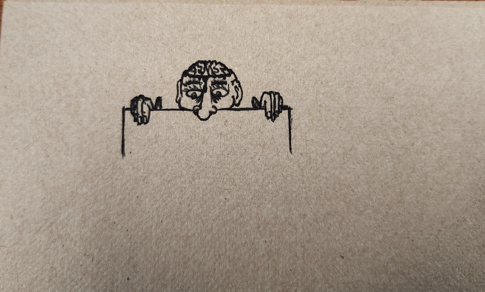 Marker drawing on kraft paper of a figure peeking over a ledge